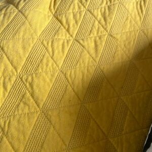 King size yellow quilt